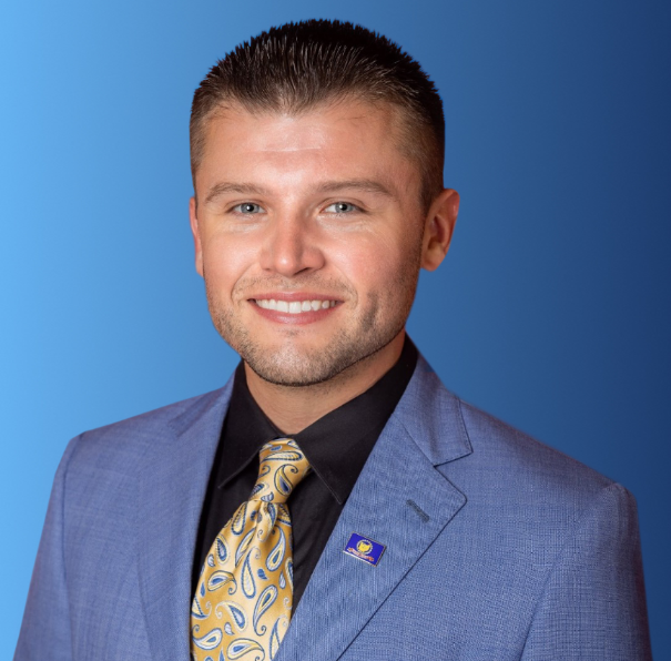 Connor-Rose-Headshot-Blue-Background - Copy - Copy - Copy - Copy - Copy - Copy